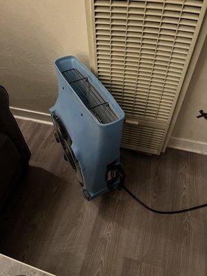 The single fan given to dry out two entire apartments full of water damage.