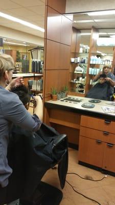 Master stylist Dinah Rodriguez applying her talented skills on this little young man, Max. (;