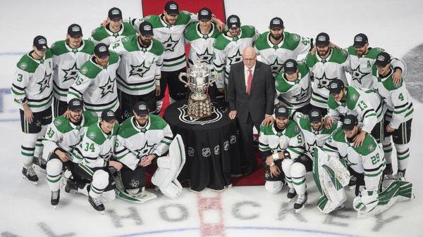 The Dallas Stars and the Clarence S. Campbell Bowl after winning the 2020 NHL Western Conference Championship.