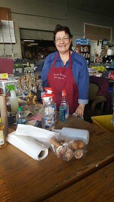 Volunteer, Jane, smiling in receiving