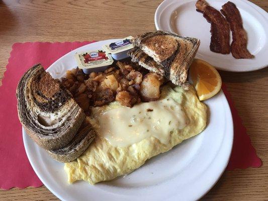 Veggie omelet with pepper jack cheese, home fries, rye bread and a side of bacon (I ate one piece, comes with three).