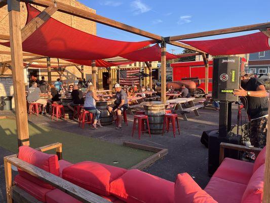 Fun outdoor patio complete with putting green and music!