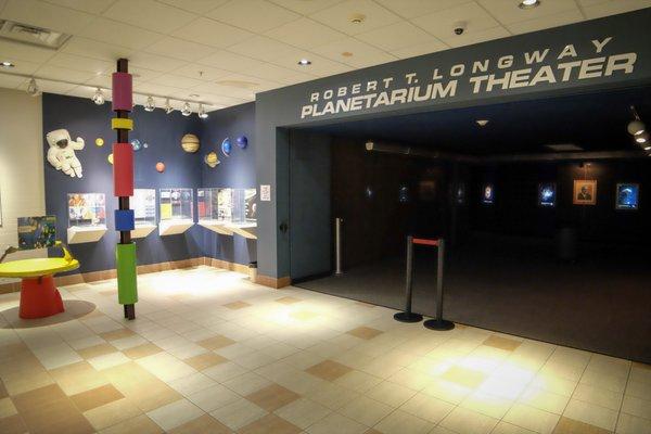 Through the entrance to the dome, you'll find fun black light murals of planets and constellations.