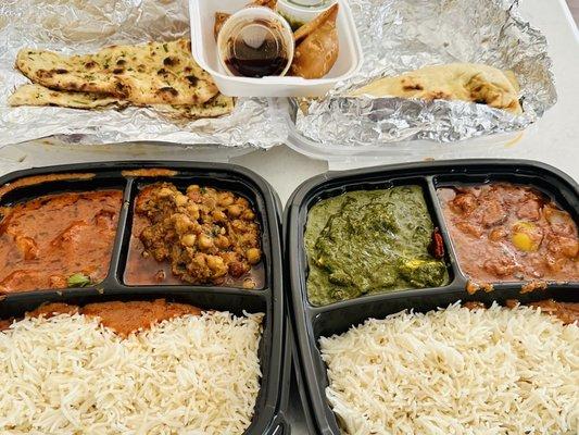 Two lunch platters!  Butter chicken, chicken tiki masala, Chana masala, and a spinach and cheese dish!  Yum!