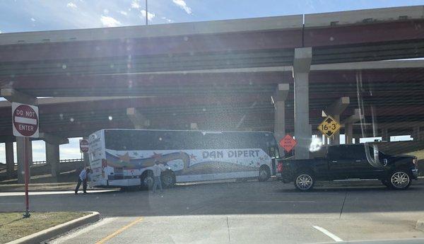 Bus wedged at intersection