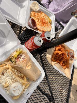 Gyro and feta fries. Onion rings. Philly cheesesteak pita.