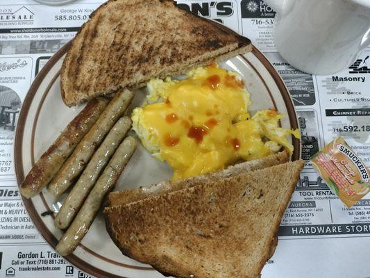 Two scrambled eggs, cheese, toast & sausage $9.99