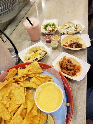 chips & queso and tacos: the Texican, spicy fried chicken, barbecue brisket, Philly, and the Rusty taco and frozen prickly pear margarita