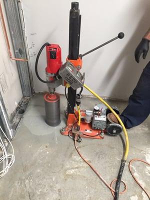 Core drilling to install plumbing