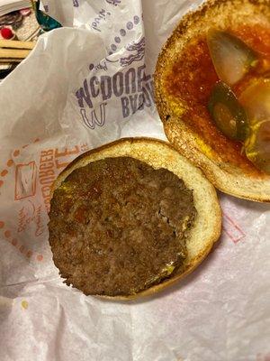 This is supposed to be a Mc double where is the onions where is the cheese where is the other patty?