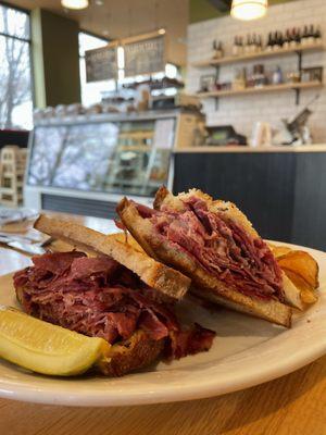 Combination pastrami and corned beef on rye.