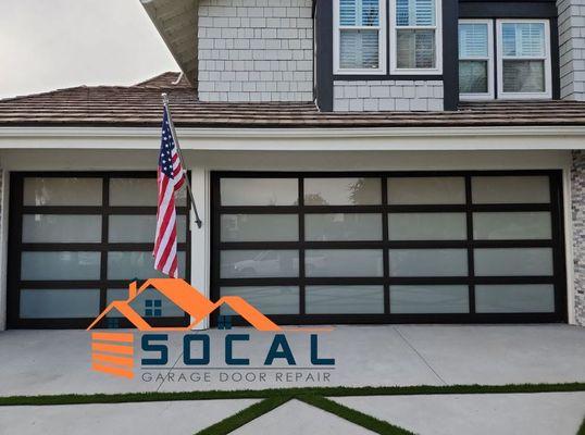 Double & Single | Full-View Glass Garage Doors | White Laminated & Bronze Anodize Frame | SoCal Garage Door Repair Inc.