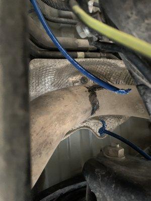 melted airbag line that they ran directly under the exhaust