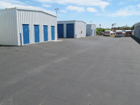 Extra wide driveways  for easy truck access.  Super tall doors and ceilings for large objects, RVs, boats or just lots of stuff!