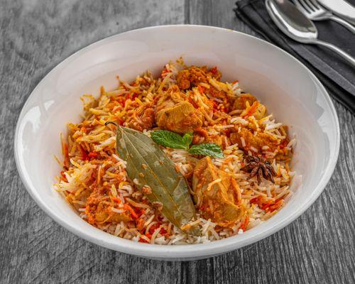 Basmati rice cooked with Chicken, saffron, yogurt and spices.