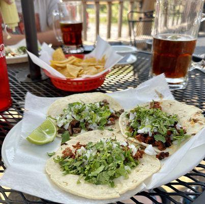 Authentic tacos - pastor, chorizo, and steak.