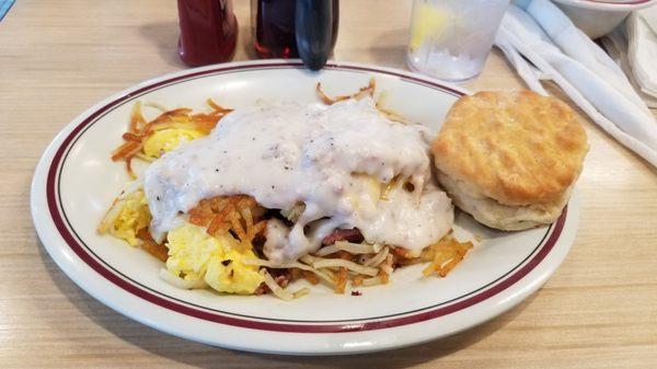 Stuffed hashbrowns, pulled pork and bacon with sausage gravy