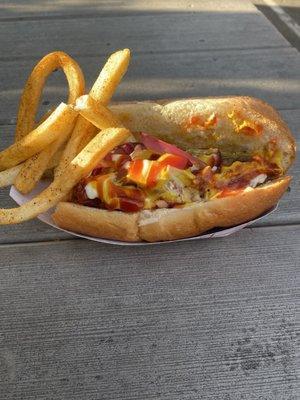 Hot dog with mustard, relish, onions, and ketchup