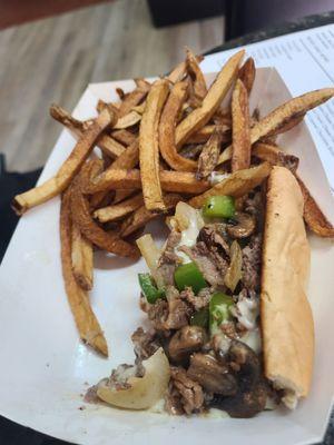 Half a philly cheese steak and fries.  (the other half of the cheese steak was eaten before I could get a photo)