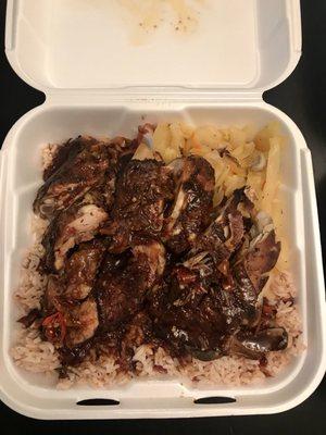 Jerk chicken (fall off the bone) w/ rice and steamed veggies (Size L, $12.50)