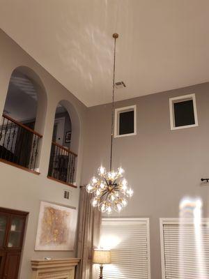 Chandalier hung in a 23 ft. Ceiling