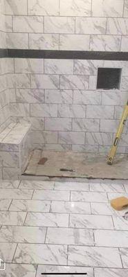 Full tile shower,walls and floors