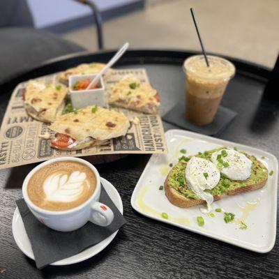 Honey Lavender Latte, Vietnamese Shakerato, Avocado Toast, and Yugo Sandwich.