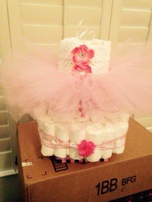 "Diaper cake" decorated with things from whimsy