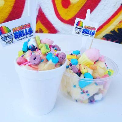 Charmed I'm Sure! Vanilla ice cream topped with strawberry drizzle and lucky charms marshmellows.