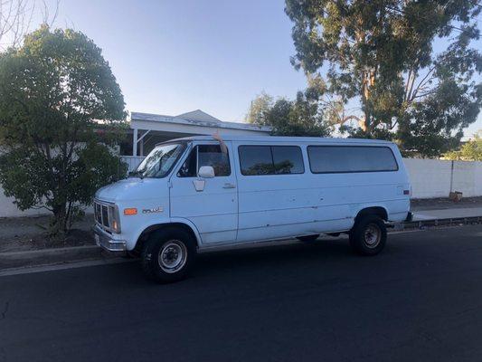 Photo of our van just for fun!  Tony ain't afraid to work on a one ton beast of a van!