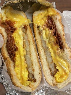 Bacon Egg and Cheese on a roll with hash brown