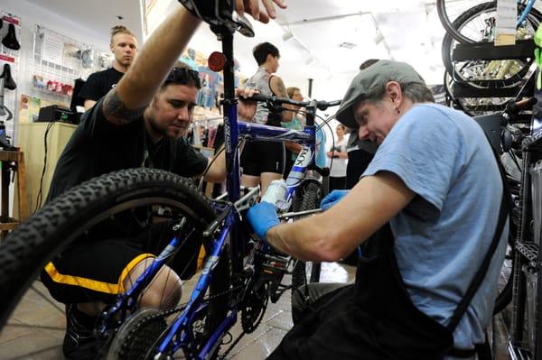 Rick working on a customer's bike.