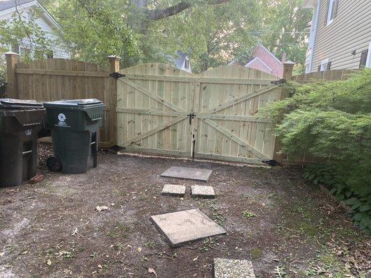 Back entrance to gate that was made by hand on site.