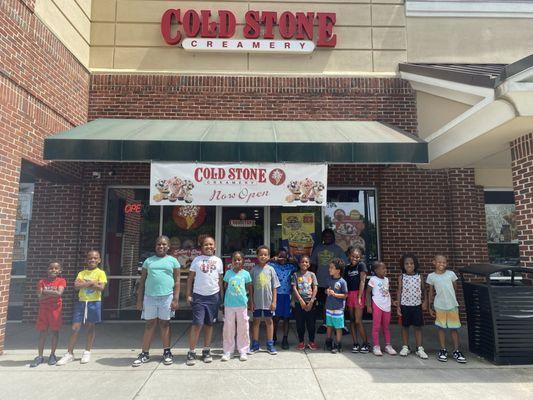 Summer camp after enjoying their scoop!