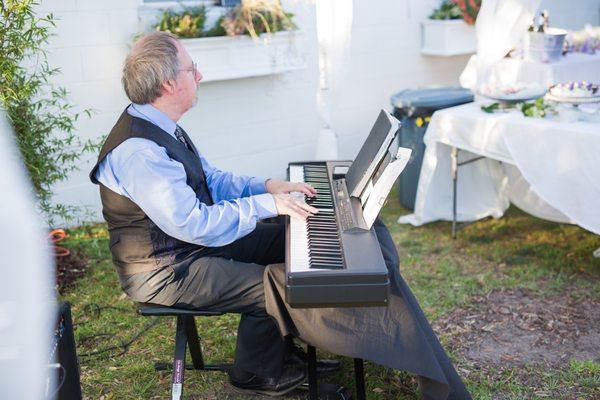 Michael Coleman played piano for us all day during our WellBeauty Image & Body Open House