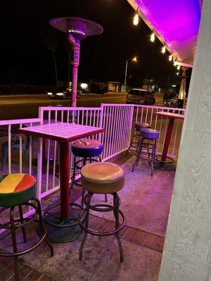 Patio seating with heat lamps, seating on the sidewalk as well