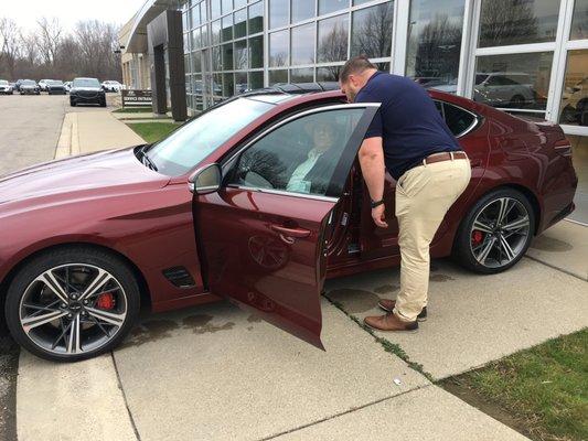 adam showing hubby new details of the car...