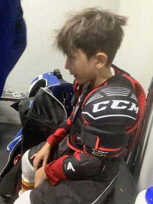 Watching my little get ready for his hockey camp