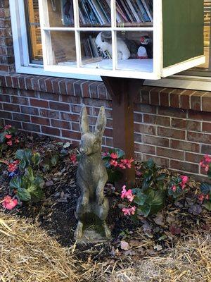 Meet our new school mascot, Riley the reading rabbit. He lives right below our mini library out front.