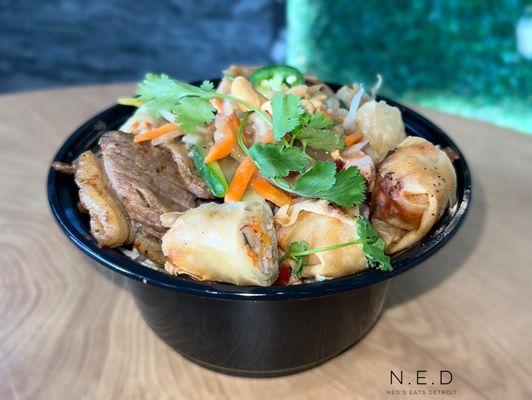 Vermicelli Bowl with Egg Rolls, Grilled Pork, Roasted Pork Belly, and Steak