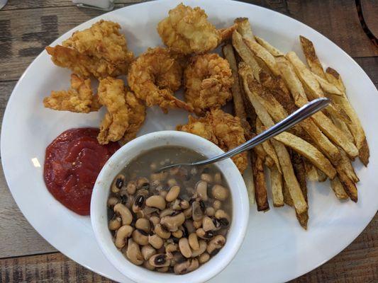 Shrimp special with french fries and black eyed peas