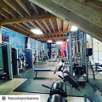 View down the belly of the gym under the top deck