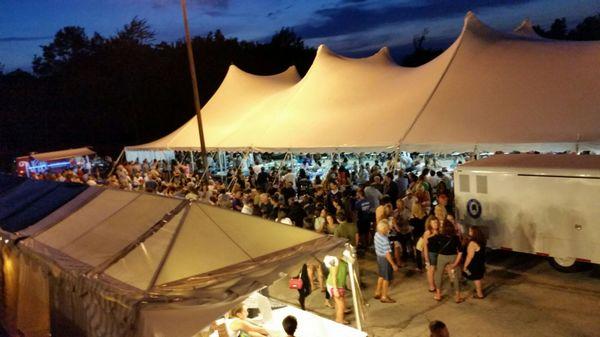 View of the outdoor midway and tent.