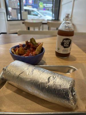 Carnitas chips,  salsa and iced tea.