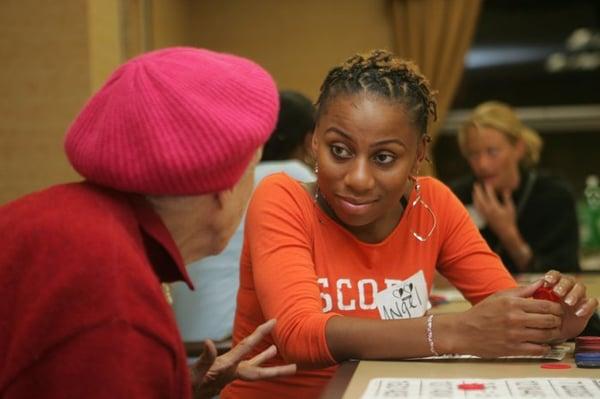 Volunteers provide conversation, games, skilled recreation, and meals to seniors living in nursing homes or public housing.