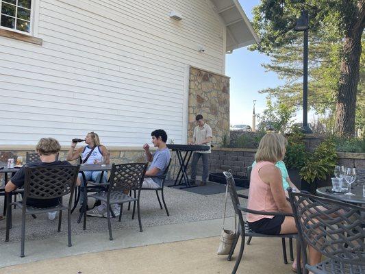 A lovely summer evening sipping wine on the patio listening to a fantastic pianist.