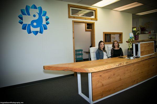 Kimmy and Kristina at the reception desk. Local thought, design and products are used throughout the wellness clinic.