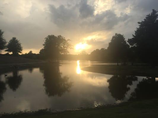 Sunset over the lake at the Olive Branch Park