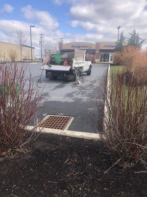 Prepping flower beds for mulch.