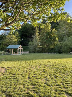 Large community pit! Fun to meet new people and enjoy the scenery. Off to the left is a covered bbq pit